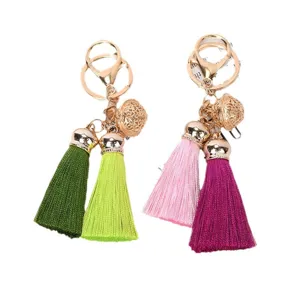 Elegant set of 2 colorful tassel keychains featuring gold hollow bells and metal clasps
