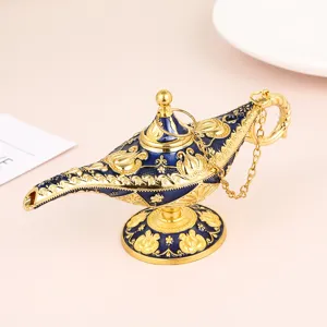 Élégant ornement de lampe d'Aladdin vintage en métal doré et bleu pour décoration maison.