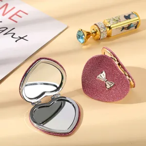 Portable pink glitter heart-shaped folding double-sided makeup mirror with bow decoration for girls