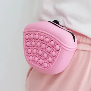 Pink silicone dog treat training pouch portable waist bag for outdoor pet walking and feeding.