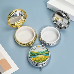 Portable round metal pill box with mirror and artistic oil painting landscape lid