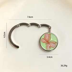 Tragbarer klappbarer Taschenhalter aus Metall mit Schmetterling, 7,6 cm x 4,5 cm