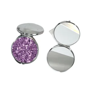 Miroir de poche rond en métal avec finition paillettes violettes et double face en verre