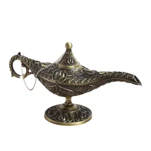 Antique bronze Aladdin's magic lamp decorative ornament with intricate floral carvings