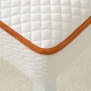 Thickened elastic dining chair cover detail, quilted fabric with brown piping and texture.