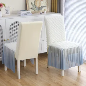 Stretch dining chair slipcover with elegant gradient blue mesh skirt for modern home decor.