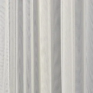 White sheer lace curtain fabric detail showing delicate mesh texture and vertical folds.