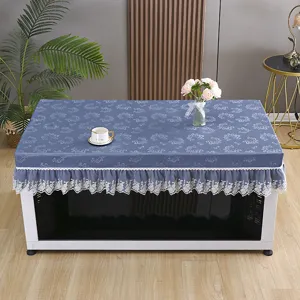 Copritavolo riscaldato rettangolare grigio-blu con gonna in pizzo bianco, impermeabile.