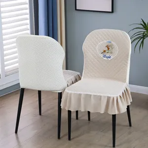 Housse de chaise de salle à manger nordique luxueuse, élégant modèle incurvé avec broderie de cerf.