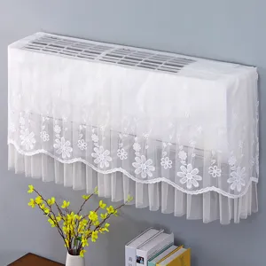 Copertura antipolvere per condizionatore in pizzo bianco ricamato, design a rete traspirante.