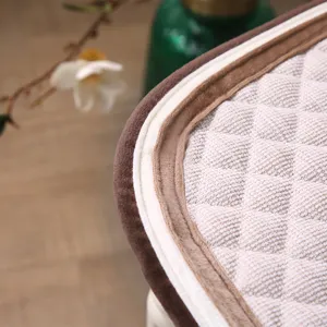 Close-up detail of thickened quilted chair cushion with multi-layer piping edge design.