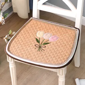 Quilted dining chair cushion with cute tulip embroidery, soft thick seat pad for home office.