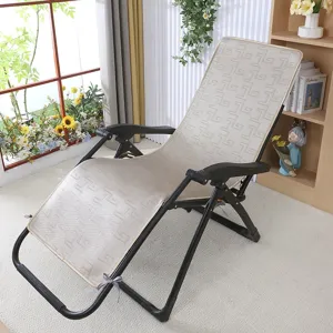 Foldable lounge chair with comfortable patterned cushion and sturdy black metal frame for indoor use.