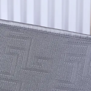 Grey mesh rocking chair cushion detail close up, breathable fabric with neat edge piping.