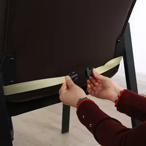 Detail view of brown leather chair cover strap and buckle, durable and easy to install.