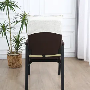 Detail view of the knitted chair cover backrest protector showing texture and strap design.