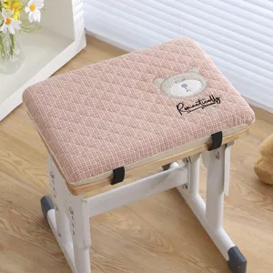 Thickened plaid student chair cushion with cute bear embroidery and secure straps for daily use.