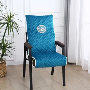 Blue quilted chair cover detail, elegant swan embroidery design, comfortable home seating decor.