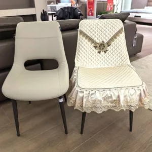 Quilted beige dining chair cover with elegant lace ruffle and embroidery for home decor.