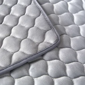 Detailed view of thickened quilted waiting chair cushion cover with neat edge binding.