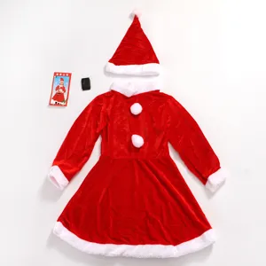 Rode fluwelen kerstjurk en muts set voor kinderen met witte pluche rand afwerking
