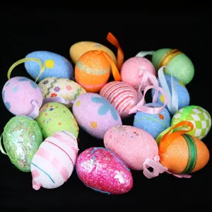 Close-up detail of colorful glitter and patterned foam Easter eggs featuring hanging ribbons