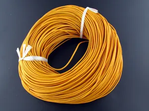 Macro detail of orange round cowhide leather cord for DIY jewelry making and beading