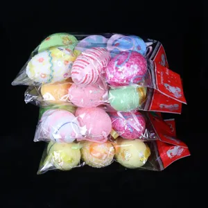 Detailed view of colorful Easter foam eggs in plastic packaging for festive decoration.