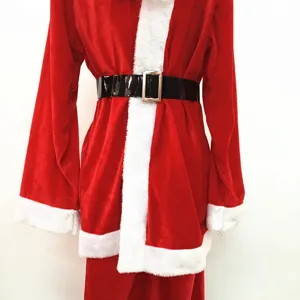 Close-up of a red velvet Santa Claus costume with white fur trim and a black belt.