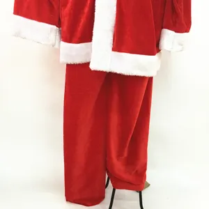 Close-up detail of plush red velvet Santa Claus costume pants and white fleece trim