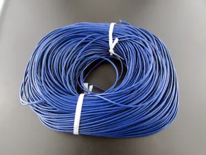 Detailed view of deep blue cowhide leather cord for DIY jewelry making and craft projects