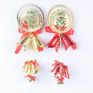 Detailed pair of 30cm Christmas bell pendants featuring red ribbons and gold rings