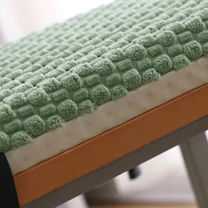 Close-up detail of the thick plush memory foam seat cushion with soft texture for warm chair.