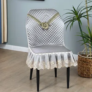 Quilted dining chair cover with gold lace embroidery, universal slipcover for home decor.