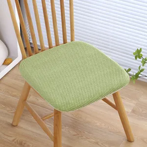 Cuscino per seduta in memory foam verde, design a griglia antiscivolo per sedia da ufficio.