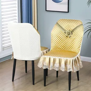 Detailed view of luxury quilted dining chair cover with elegant lace trim and universal fit.