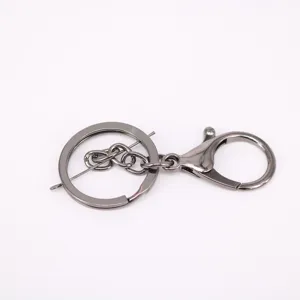 Close-up detail of a durable gunmetal metal lobster clasp and key ring for DIY bag charms