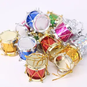 Detailed view of colorful mini laser Christmas drum ornaments for festive decor