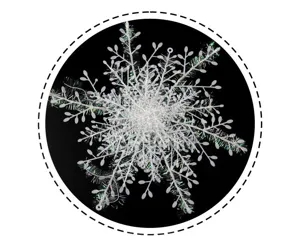 Close-up of white plastic snowflake hanging ornament with iridescent tinsel fibers