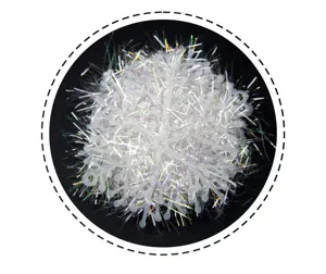 Macro view of white plastic Christmas snowflake with iridescent tinsel details