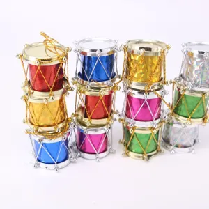 Detailed view of colorful laser Christmas drum ornaments in a variety of vibrant colors