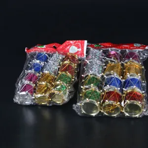 Detailed view of colorful laser Christmas mini drum ornaments in transparent packaging