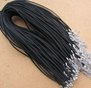 Detailed view of black wax line necklace cords with silver lobster clasps for DIY jewelry