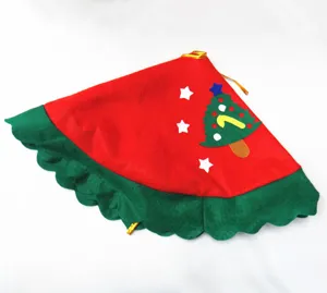 Close-up of a festive red and green felt Christmas tree skirt with cute tree appliques