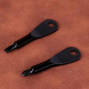 Close-up detail of black portable EDC mini flat and Phillips head screwdriver keychains.