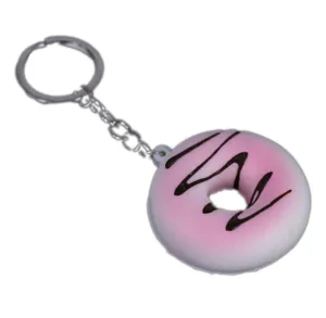 Λεπτομέρεια ροζ μπρελόκ ντόνατ squishy με διακοσμητικές γραμμές ψεύτικης σοκολάτας