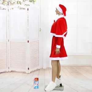 Vista laterale completa del costume di Babbo Natale in velluto rosso per donna su manichino