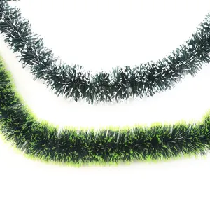 Detail view of 2m Christmas tinsel garland in dark green with white and lime tips