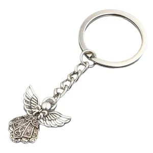 Vintage zilveren engelenvleugel sleutelhanger met patronen voor DIY sieraden accessoires.