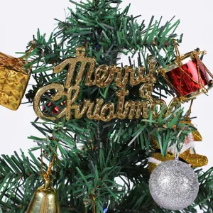 Detailed view of festive Christmas tree ornaments with golden Merry Christmas lettering
